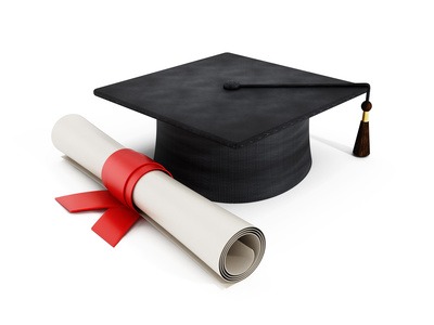 Mortar board and diploma isolated on white.